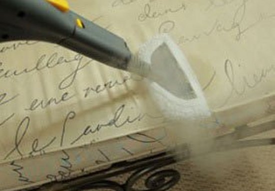 Image of steam cleaning mattress